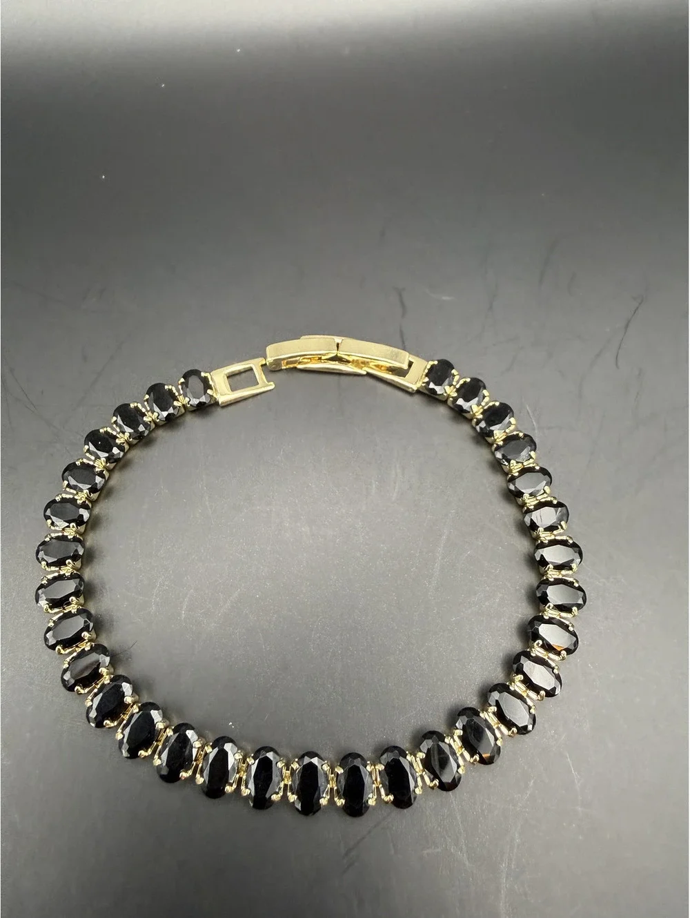 candy+clover black oval crystal gold tone tennis bracelet